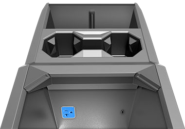 Center console with arm rest lifted, revealing power outlet in the compartment