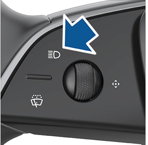 Closeup of high beam button on steering yoke.
