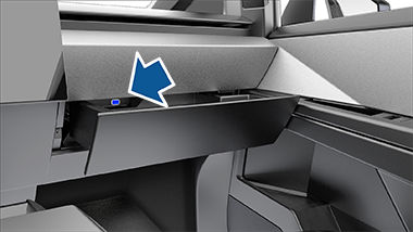 Glovebox open, revealing a USB-A drive