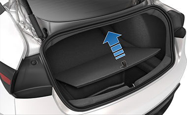 Rear trunk with arrow pointing upwards from cargo cover strap