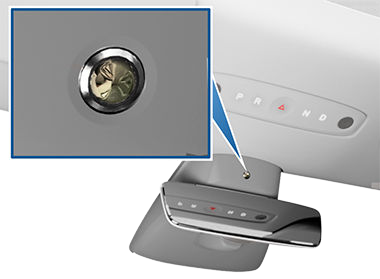 Zoombox with a camera lens, pointing to its location above the rear view mirror